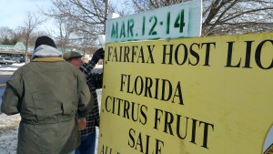 Fairfax Lions prepare signs advertising the March Sale