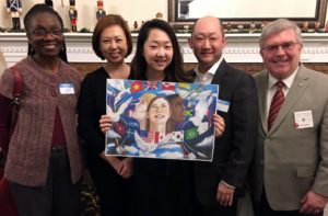 Kaitlin Yang, parents, art teacher Linda Ledbetter, and Lion Jeff Root contest chair